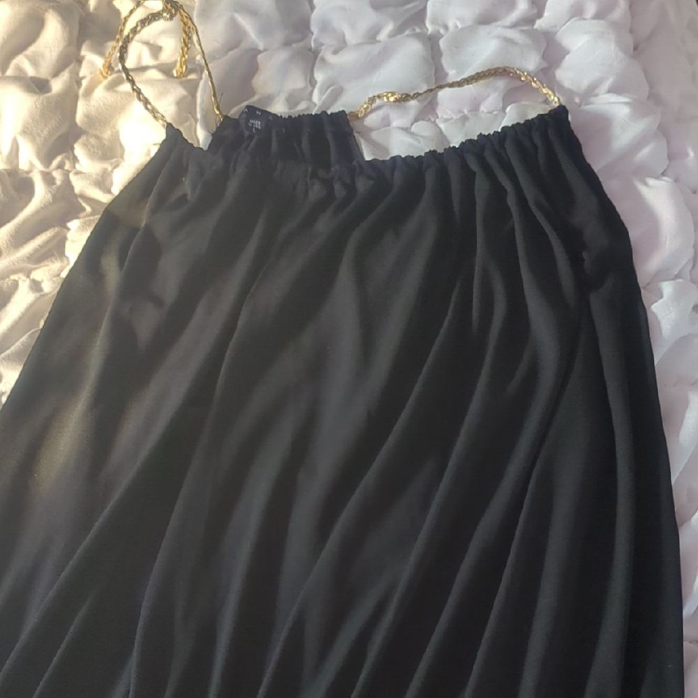 Tiana B. Black Garment with Gold Details